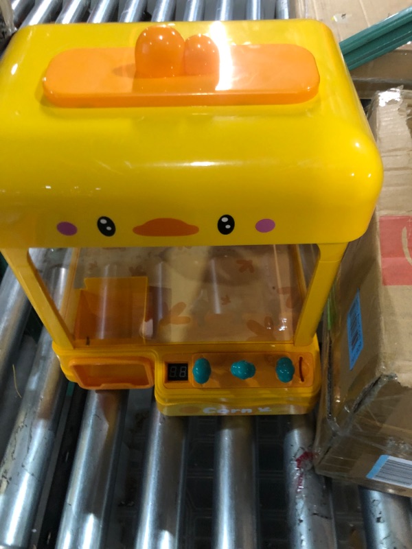 Photo 2 of * not functional * sold for parts * repair * 
cxjoigxi Mini Claw Machine for Kids with Prizes,Volume Control and 60 Seconds Countdown