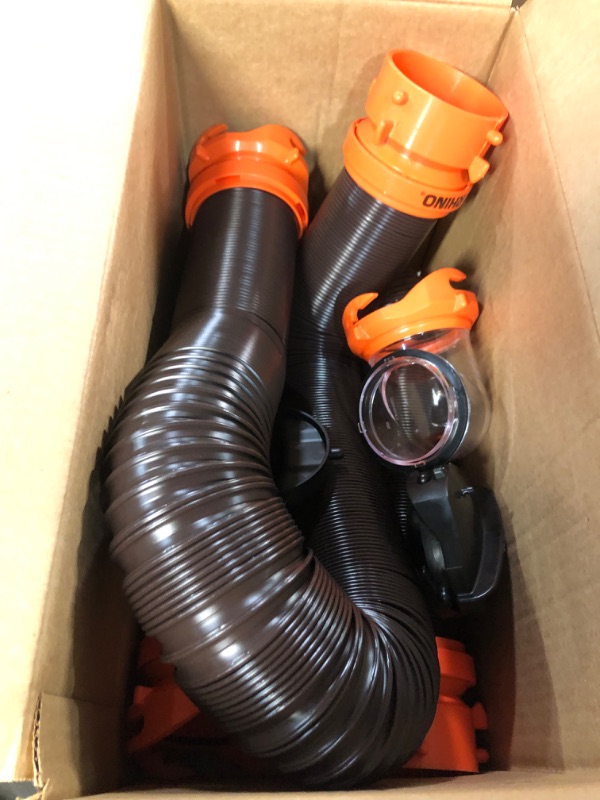 Photo 4 of Camco 20' (39742) RhinoFLEX 20-Foot RV Sewer Hose Kit, Swivel Transparent Elbow with 4-in-1 Dump Station Fitting-Storage Caps Included , Black , Brown 20ft Sewer Hose Kit Frustration-Free Packaging