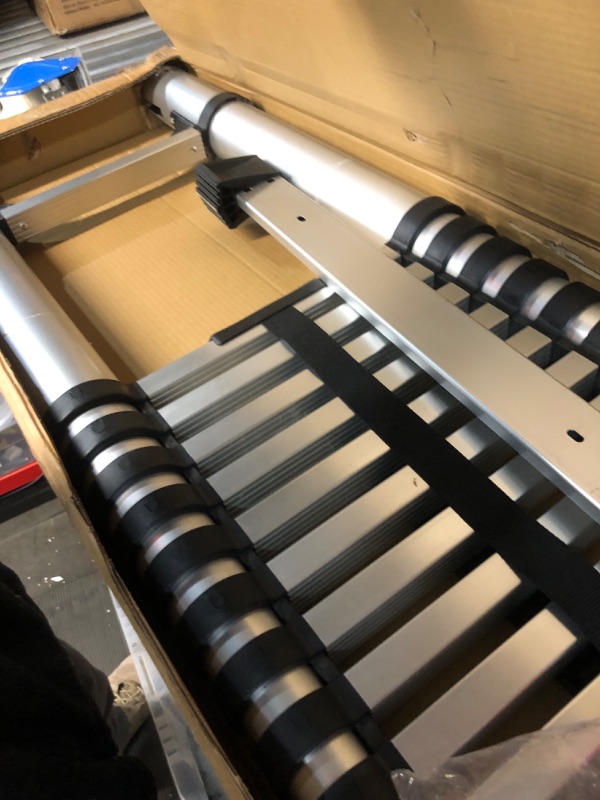 Photo 1 of **missing parts**
Wolec 20FT Telescoping Ladder,