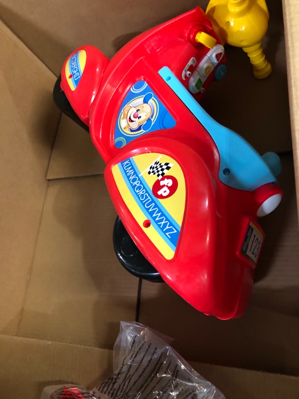 Photo 3 of Fisher-Price Laugh & Learn Smart Stages Scooter, musical ride-on toy with Smart Stages learning content for toddlers ages 1 to 3 years Standard