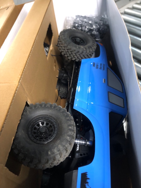 Photo 6 of ***BATTERY AND CHARGER NOT INCLUDED - UNABLE TO TEST***
Axial RC Truck 1/10 SCX10 III Base Camp 4WD Rock Crawler Brushed RTR