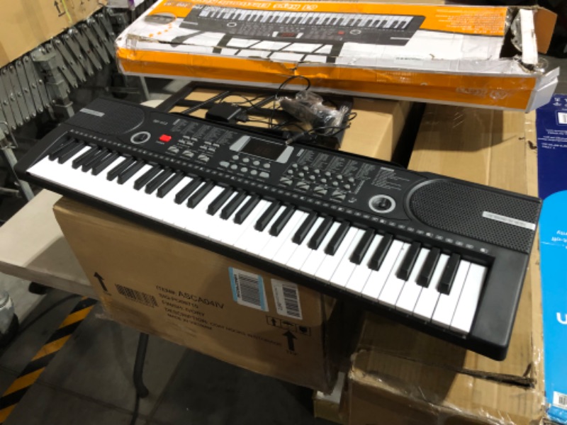 Photo 2 of ***USED - POWERS ON***
61 keys piano keyboard, Electronic Digital Piano with Built-In Speaker Microphone