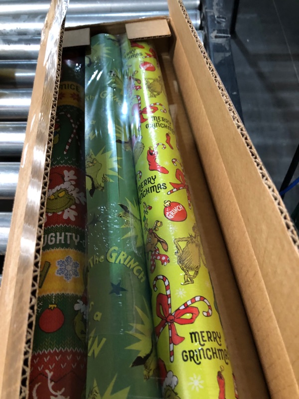 Photo 3 of American Greetings Christmas Wrapping Paper with Cut Lines Bundle, The Grinch (3 Rolls, 105 sq. ft.)