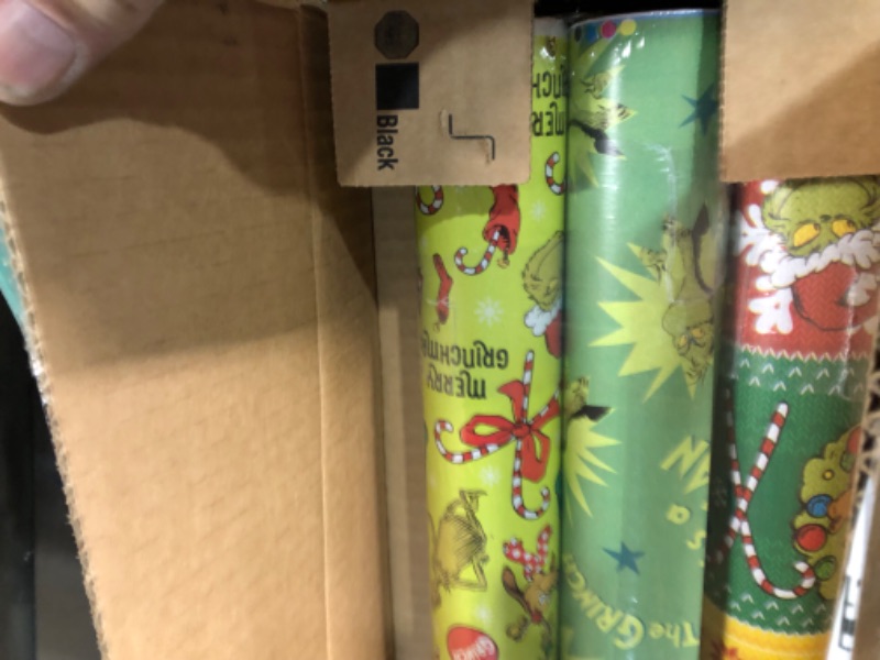 Photo 2 of American Greetings Christmas Wrapping Paper with Cut Lines Bundle, The Grinch (3 Rolls, 105 sq. ft.)