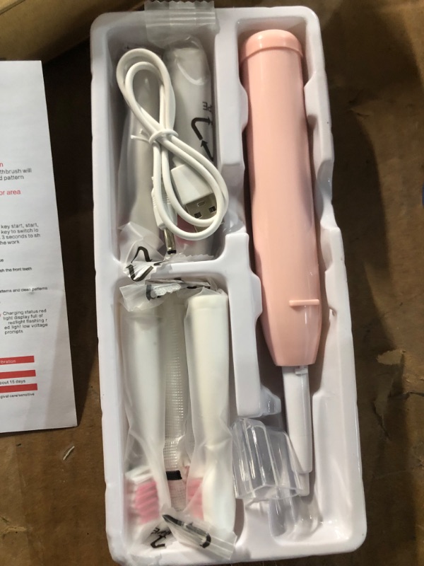 Photo 2 of AIPOEXUNO Electric Toothbrush 5 Brush Heads Adults and Kids(pink) White