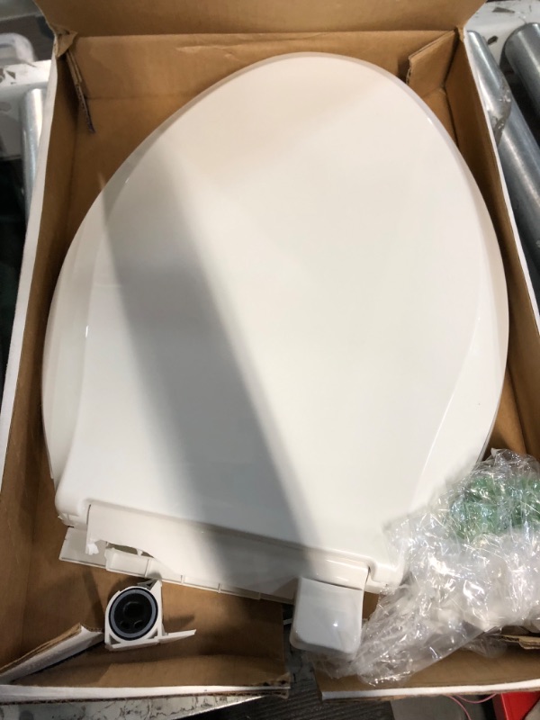 Photo 1 of **BROKEN/PARTS ONLY** for KOHLER 4636-RL-0 Cachet ReadyLatch Quiet Close Elongated Toilet Seat, White Ready Latch Elongated White