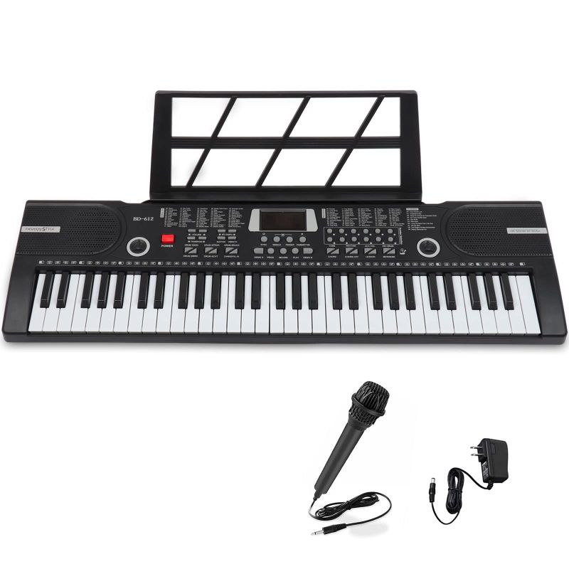 Photo 1 of **MISSING MIC AND POWER CORD** 61 keys keyboard piano can operate on batteries