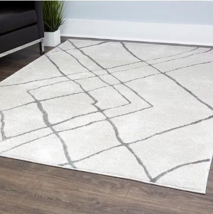 Photo 1 of **DIRTY** Bazaar Silver Strike Beige 7 ft. 10 in. x 10 ft. 2 in. Indoor Area Rug