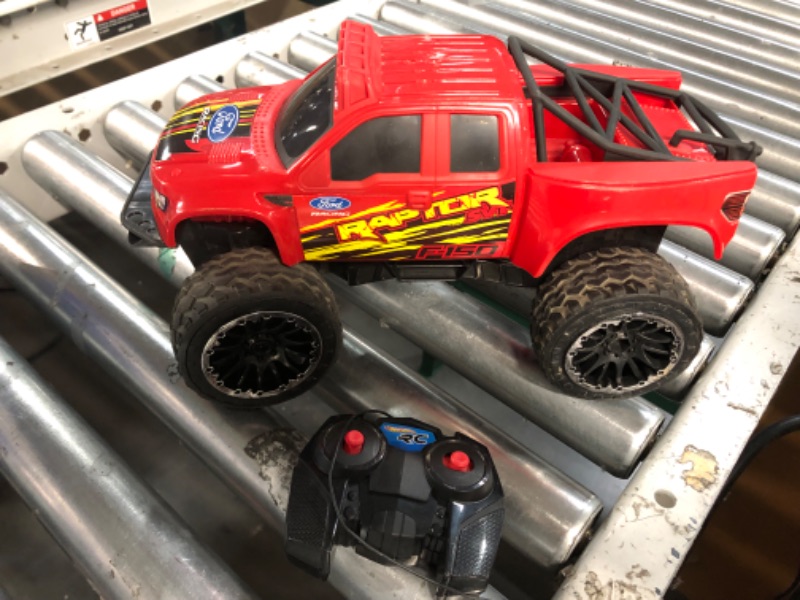 Photo 2 of ?Hot Wheels Remote Control Truck, Red Ford F-150 RC Vehicle With Full-Function Remote Control, Large Wheels & High-Performance Engine, 2.4 GHz With Range of 65 Feet HW FORD TRUCK RC