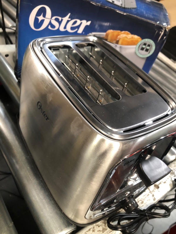 Photo 3 of **UNTESTED*  Oster 2-Slice Toaster with Advanced Toast Technology, Stainless Steel 2-Slice Toaster Gray