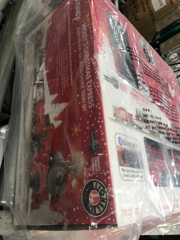 Photo 4 of **FACTORY SEALED**  Lionel Disney Christmas LionChief 0-8-0 Set with Bluetooth Capability, Electric O Gauge Model Train Set with Remote