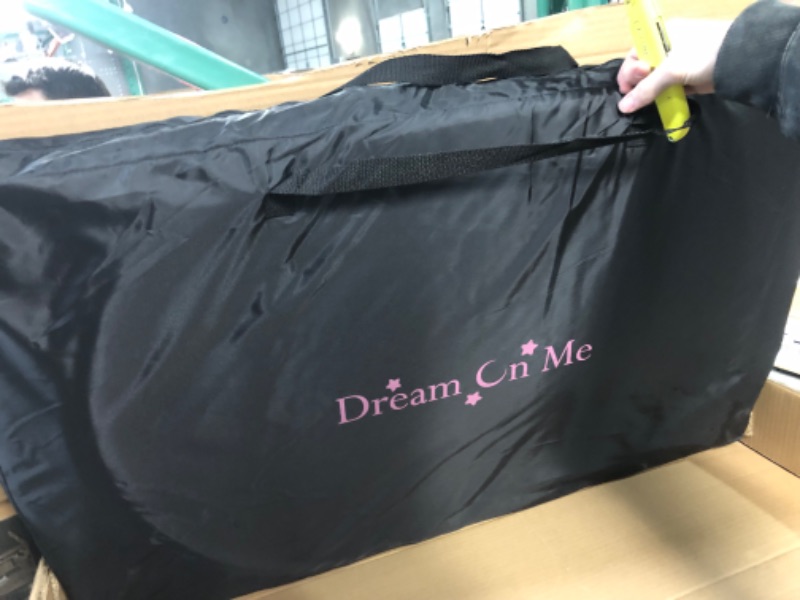 Photo 1 of Dream On Me Lotus Bassinet and Bedside Sleeper in Pink, Lightweight and Portable Baby 