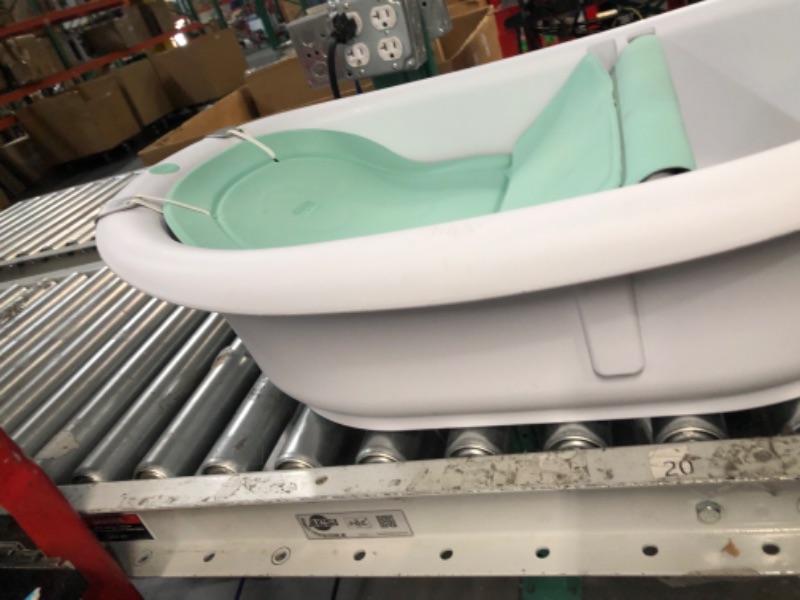 Photo 4 of 4-in-1 Grow-with-Me Bath Tub by Frida Baby Transforms Infant Bathtub to Toddler Bath Seat