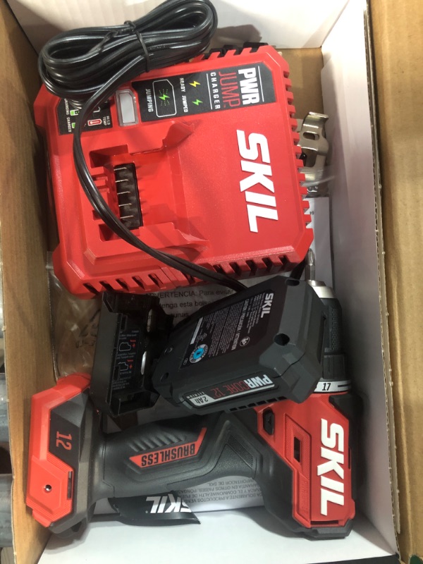 Photo 2 of (READ NOTES) Bundle of SKIL Brushless 12V 1/2 In. Compact Drill Driver Kit Includes 2.0Ah Battery and PWR JUMP Charger - DL6290A-10 + SKIL 120pc Drilling and Screw Driving Bit Set with Bit Grip - SMXS8501