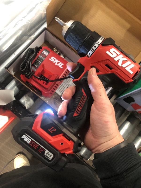 Photo 3 of (READ NOTES) Bundle of SKIL Brushless 12V 1/2 In. Compact Drill Driver Kit Includes 2.0Ah Battery and PWR JUMP Charger - DL6290A-10 + SKIL 120pc Drilling and Screw Driving Bit Set with Bit Grip - SMXS8501