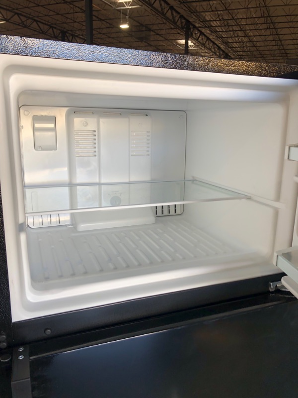 Photo 3 of **FREEZER DOOR DOESN'T SEAL***
 Whirlpool - 18.2 Cu. Ft. Top-Freezer Refrigerator - Black
