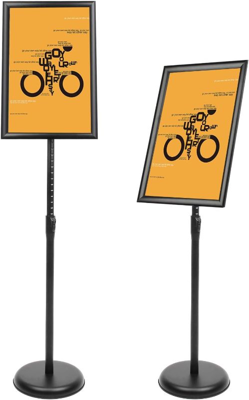 Photo 1 of (READ NOTES) DISPLAYSWORKER Adjustable Poster Sign Stand 11 x 17,Floor-Standing Sign Holder with Heavy Duty Pedestal,Aluminum Snap-Open Frame, Vertical and Horizontal View Sign Displayed, Black (11 x 17)