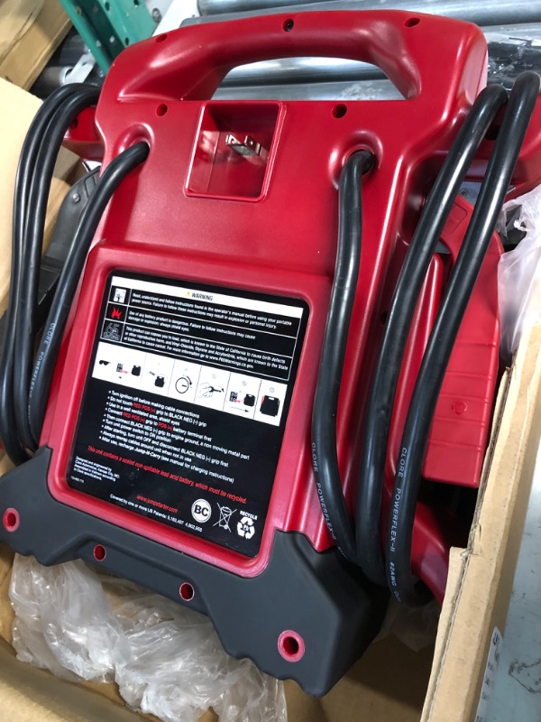 Photo 3 of Clore Automotive Jump-N-Carry JNC770R 1700 Peak Amp Premium 12 Volt Jump Starter - Red & JNC350 Jump-N-Carry JNC350 Charging Cord (for JNC660, JNCAIR, JNC770 Jump Starters), 1 Pack Red Jump Starter + Charging Cord