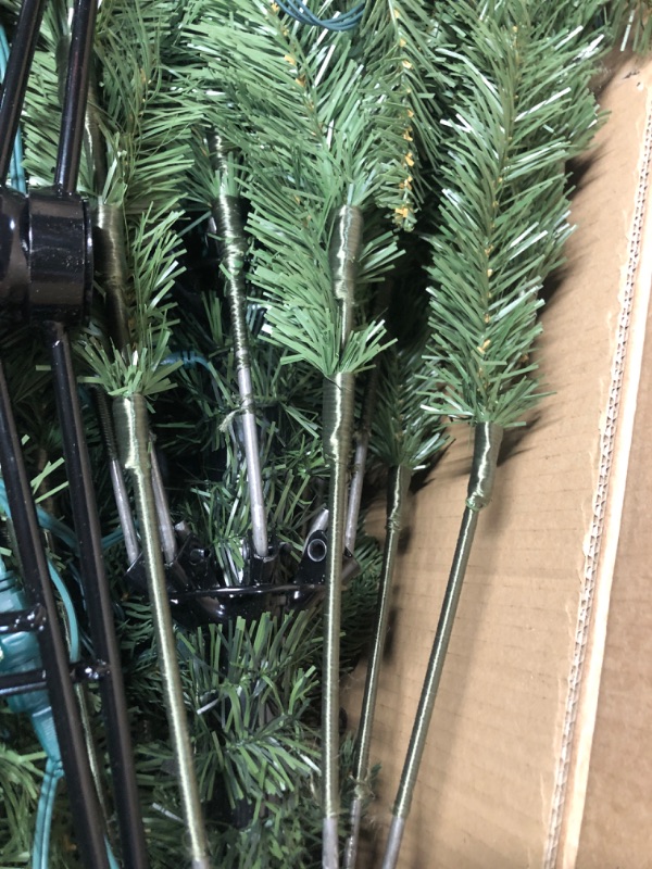 Photo 5 of  9ft/2.74m Prelit Slim Artificial Christmas Tree with 1455 Branch Tips, 500 Warm Lights and Metal Stand, 37" Wide Realistic Skinny Pencil Christmas Tree with Lights by Naomi Home Pre-lit Slim 9 ft