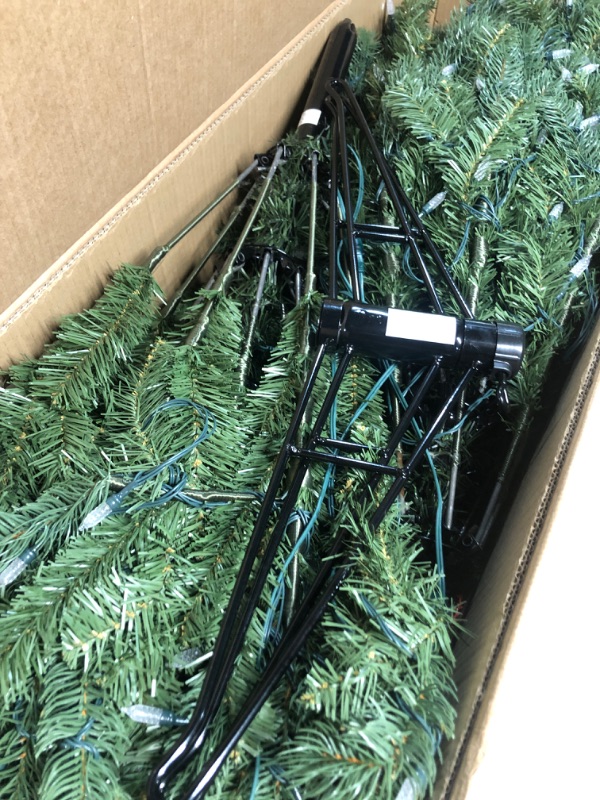 Photo 3 of  9ft/2.74m Prelit Slim Artificial Christmas Tree with 1455 Branch Tips, 500 Warm Lights and Metal Stand, 37" Wide Realistic Skinny Pencil Christmas Tree with Lights by Naomi Home Pre-lit Slim 9 ft