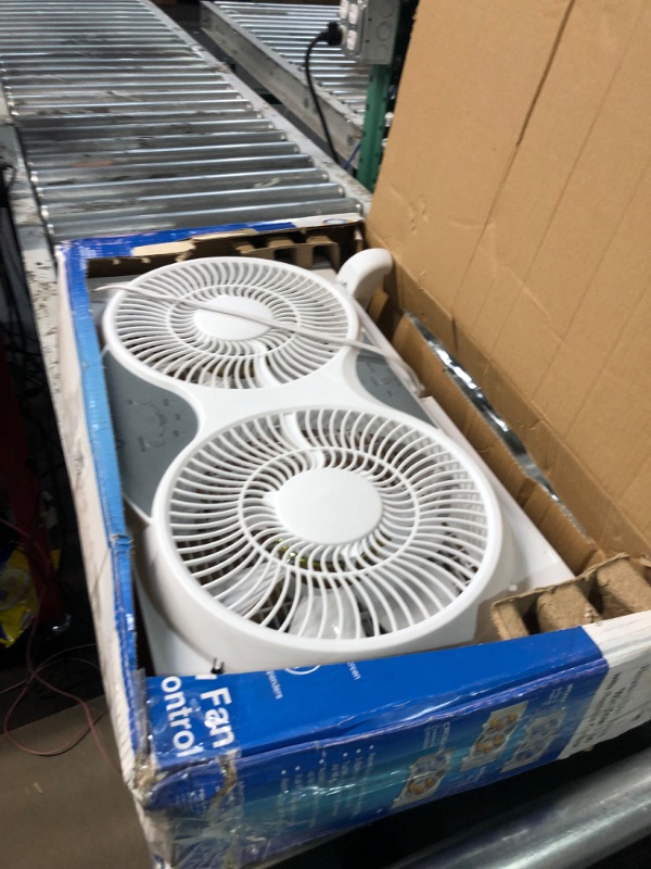 Photo 2 of **NO REMOTE - POWERS ON AND FUNCTIONS**
Comfort Zone CZ310R Adjustable Width 3 Speed Dual Reversible Multi Functional Window Sill Fan 