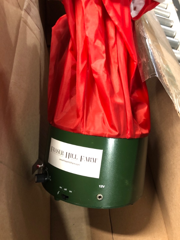 Photo 1 of **MISSING POWER CORD**
Fraser Hill Farm Let It Snow Series 29-in. Green Tree with Star Topper and Red Umbrella Base
