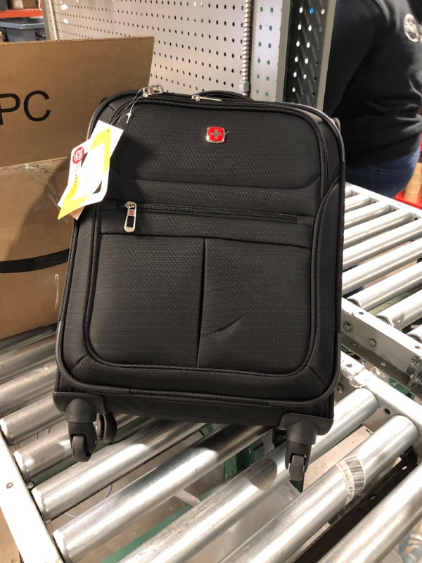 Photo 2 of **TEAR IN FRONT OF BAG - SEE PHOTOS**
SwissGear 4010 Softside Luggage with Spinner Wheels, Black, Carry-On 18-Inch Carry-On 18-Inch Black