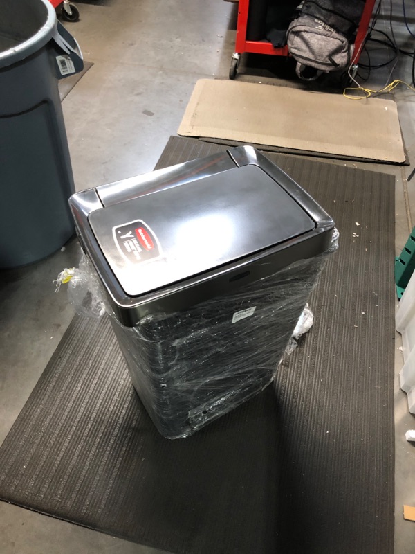 Photo 2 of **MISALIGNED/DENTED - SEE PHOTOS**
Rubbermaid Premier Series III Step-On Trash Can for Home and Kitchen, with Stainless Steel Rim, 12.4 Gallon, Charcoal