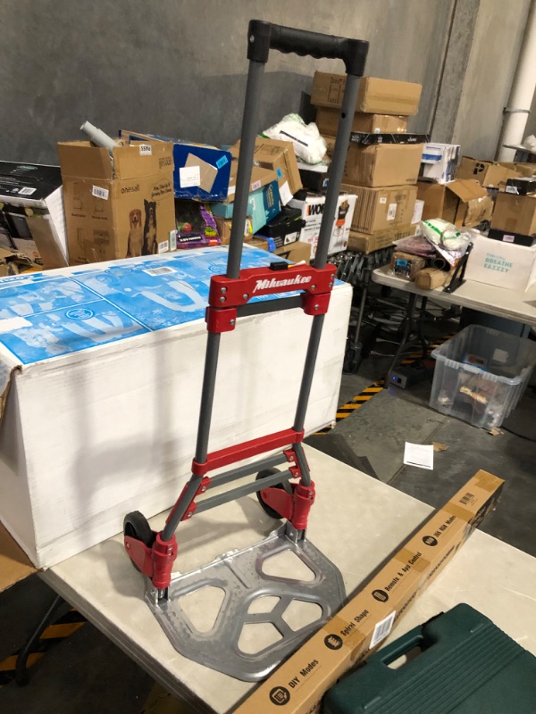 Photo 2 of ***USED - SCRATCHED - NO PACKAGING***
Milwaukee 150-lb 2-Wheel Red Steel Folding Hand Truck
