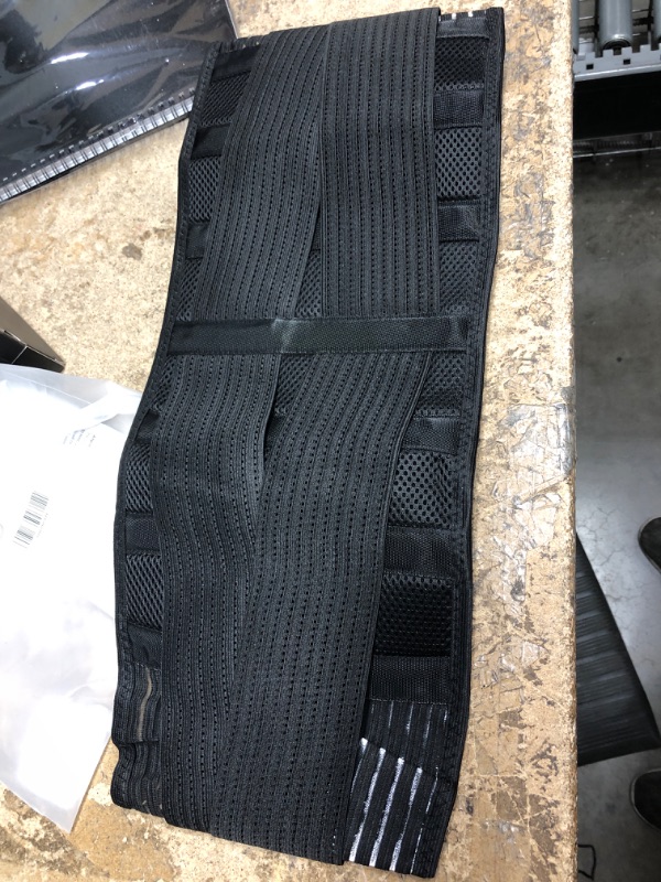 Photo 2 of LOWER BACK BRACE MEN AND WOMEN 