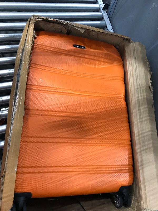 Photo 2 of *USED* BROKEN ZIPPER* Rockland Melbourne Hardside Expandable Spinner Wheel Luggage, Orange, Checked-Large 28-Inch Checked-Large 28-Inch Orange