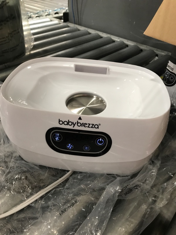 Photo 2 of Baby Brezza Bottle Sterilizer and Dryer Advanced – HEPA Filter And Steam Sterilization – Dries 33 Percent Faster Then Original - Universal Fit up to 8 Baby Bottles And 2 Sets of Pump Parts (Any Brand) Sterilizer-Dryer Advanced