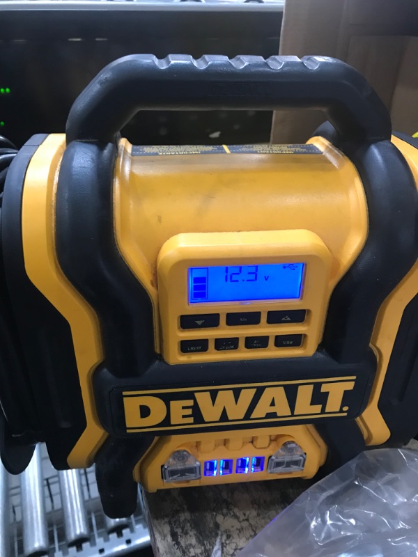 Photo 3 of DEWALT DXAEPS14 1600 Peak Battery Amp 12V Automotive Jump Starter/Power Station with 500 Watt AC Power Inverter, 120 PSI Digital Compressor, and USB Power , Yellow