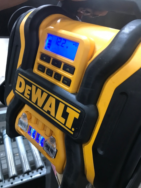 Photo 2 of DEWALT DXAEPS14 1600 Peak Battery Amp 12V Automotive Jump Starter/Power Station with 500 Watt AC Power Inverter, 120 PSI Digital Compressor, and USB Power , Yellow