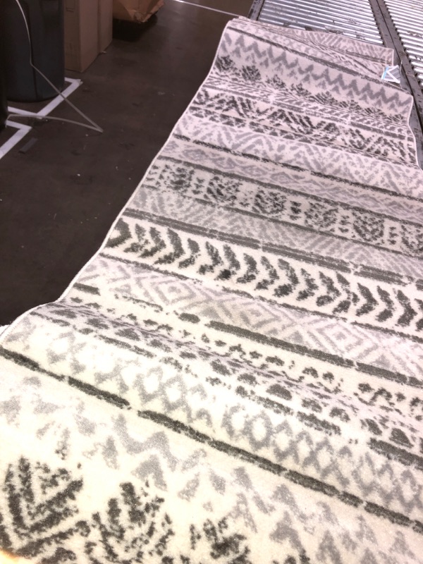 Photo 1 of 2FT X 7 FT WHITE PATTERNED RUNNER RUG 