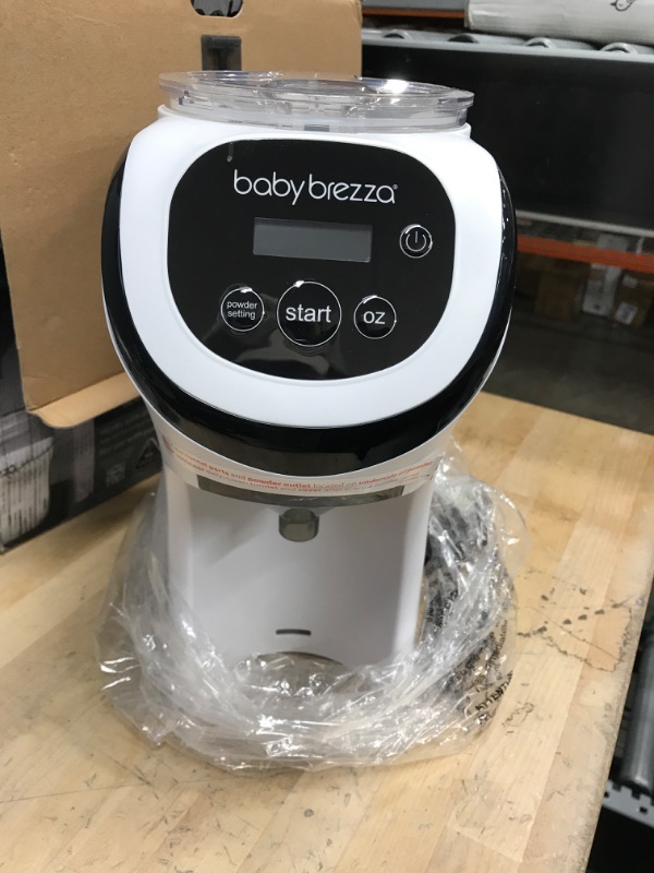 Photo 2 of Baby Brezza Formula Pro Mini Baby Formula Maker – Small Baby Formula Mixer Machine Fits Small Spaces and is Portable for Travel– Bottle Makers Makes The Perfect Bottle for Your Infant On The Go
