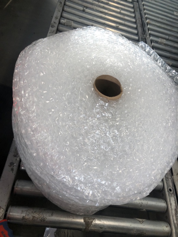 Photo 1 of Amazon Basics Perforated Bubble Cushioning Wrap - Medium 5/16", 12-Inch x 100-Foot Long Roll