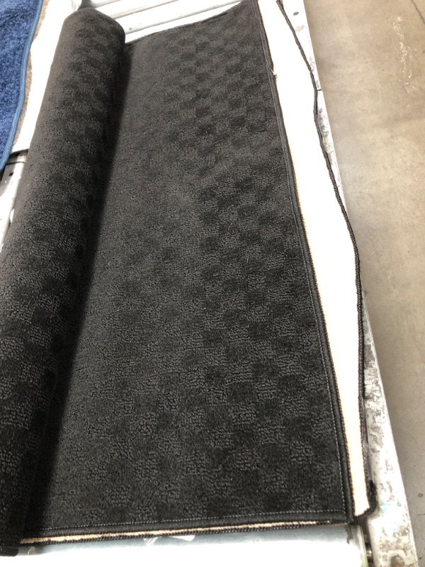 Photo 1 of 3 x 12 rug (black)