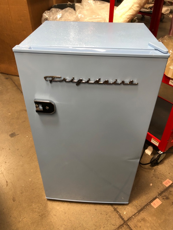 Photo 6 of Frigidaire EFR376-BLUE 3.2 Cu Ft Blue Retro Bar Fridge with Side Bottle Opener
