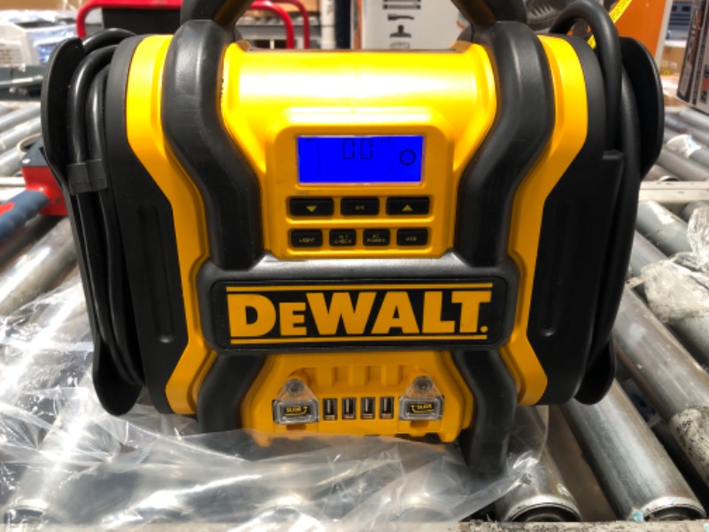 Photo 2 of **MISSING CHARGER**
DEWALT DXAEPS14 1600 Peak Battery Amp 12V Automotive Jump Starter/Power Station with 500 Watt AC Power Inverter Yellow