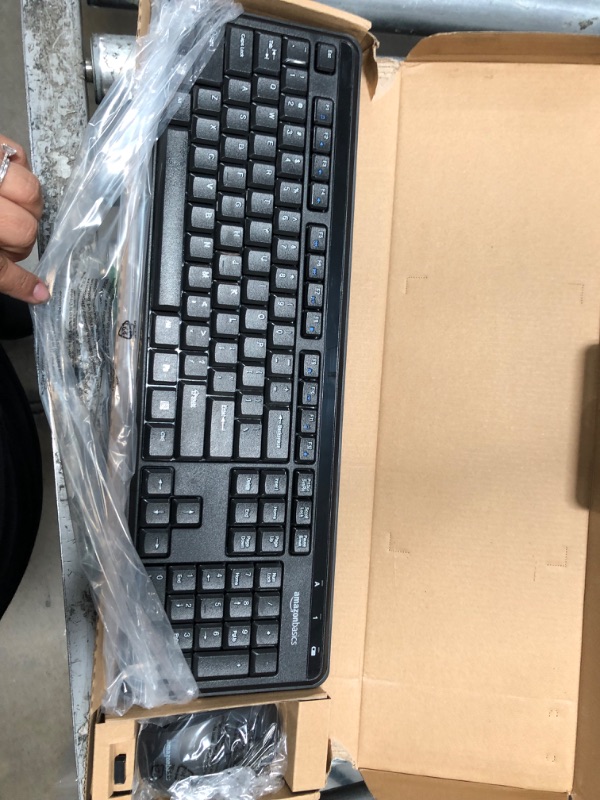 Photo 4 of Amazon Basics Wireless Computer Keyboard and Mouse Combo - Quiet and Compact - US Layout (QWERTY)