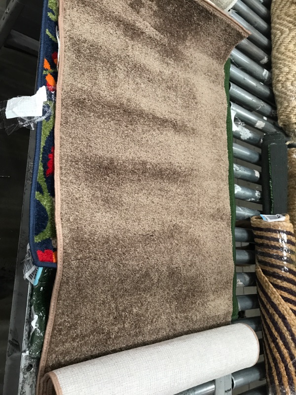 Photo 1 of 2X6FT AREA RUG- BROWN