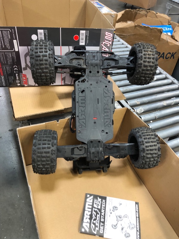 Photo 5 of ARRMA RC Truck 1/10 Outcast 4X4 4S V2 BLX Stunt Truck RTR (Battery and Charger Not Included), Bronze, ARA4410V2T1
