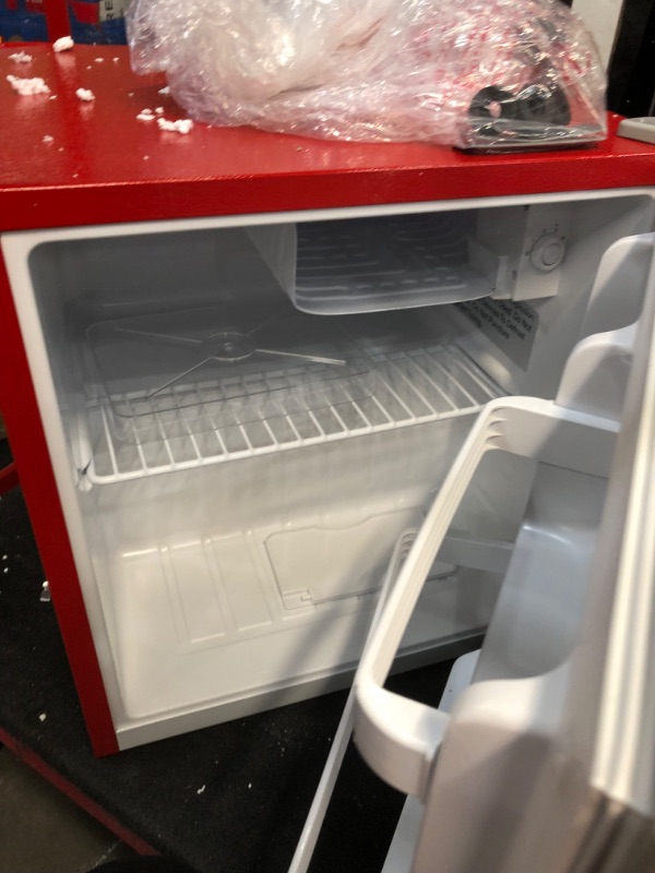 Photo 4 of **NOT FUNCTIONAL PARTS ONLY!! Red mini fridge with silver trim - 1.6 Cubic feet capacity
