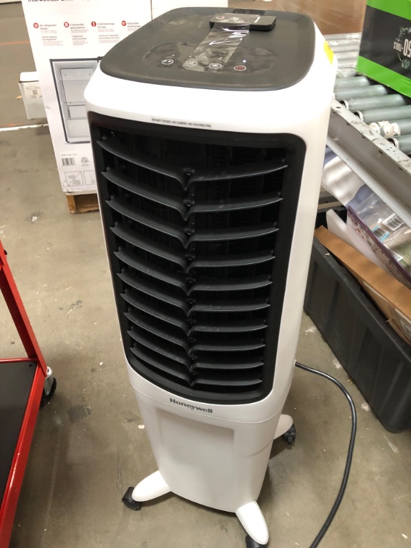 Photo 2 of Honeywell 700-CFM 3-Speed Indoor Portable Evaporative Cooler for 426-sq ft (Motor Included)