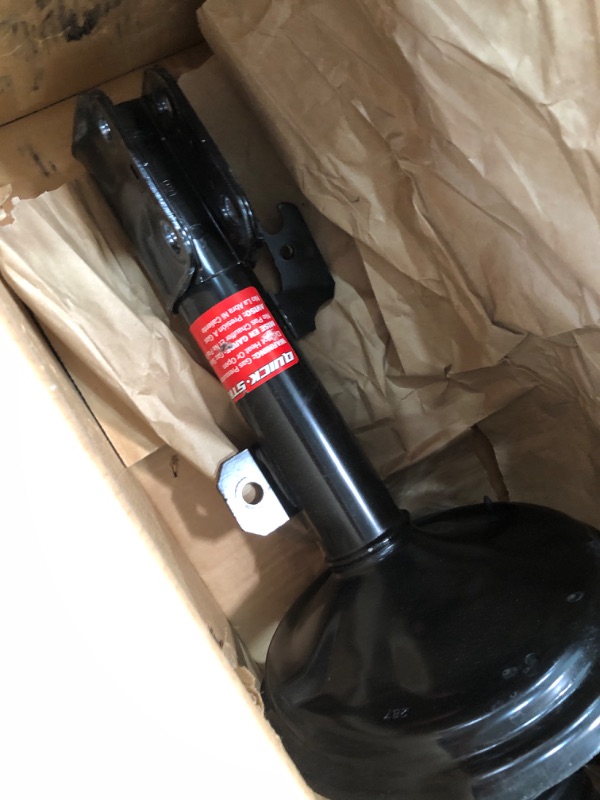 Photo 1 of Monroe Shocks & Struts Quick-Strut 272211 Strut and Coil Spring Assembly