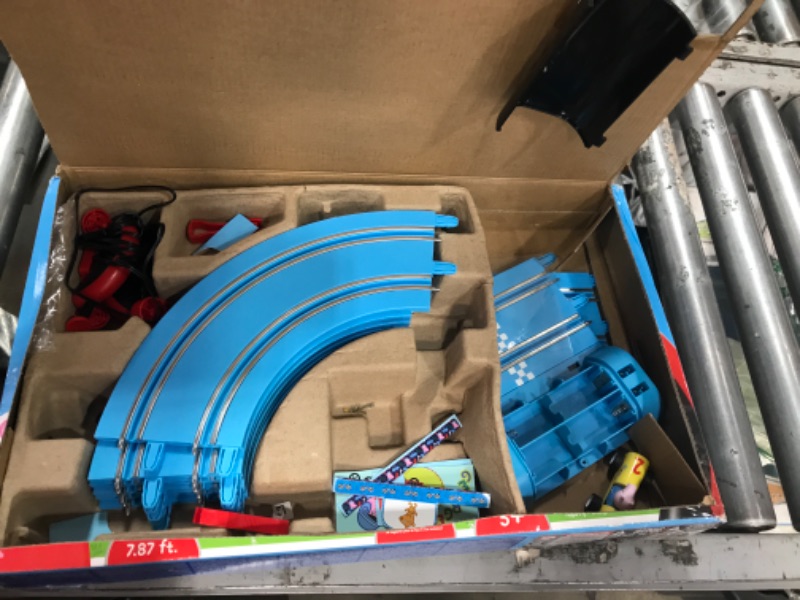 Photo 2 of Carrera First Peppa Pig - Kids GranPrix Slot Car Race Track with Spinners - Includes Peppa Pig and George Cars - Battery-Powered Beginner Racing Set for Kids Ages 3 Years and Up