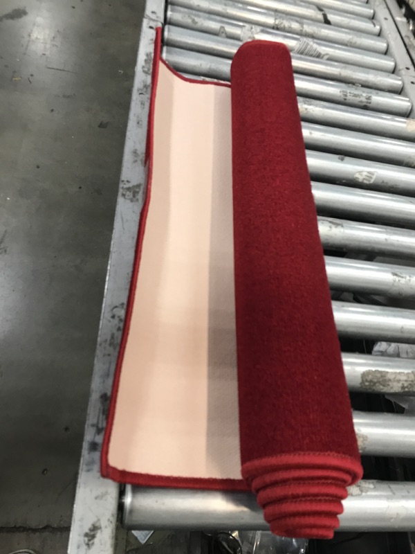 Photo 1 of 2'6" x 6' red runner rug 