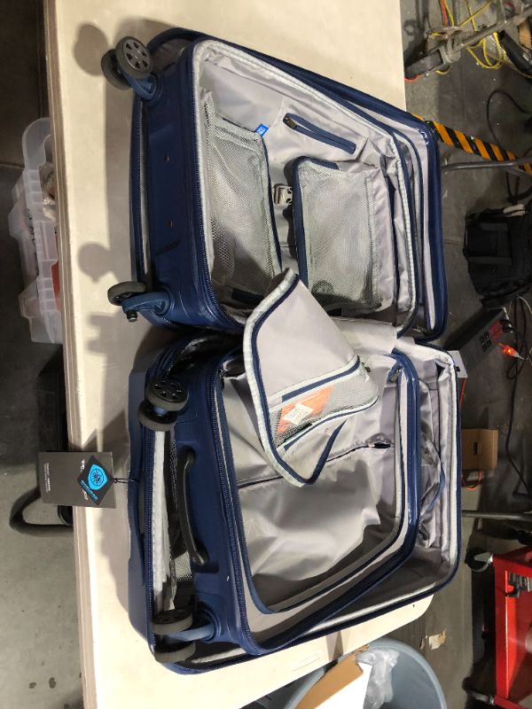 Photo 5 of ***CARRY-ON IS MISSING A WHEEL - SEE PICTURES***
Traveler's Choice Pagosa Indestructible Hardshell Expandable Spinner Luggage, Navy, 2-Piece Set (22/26)