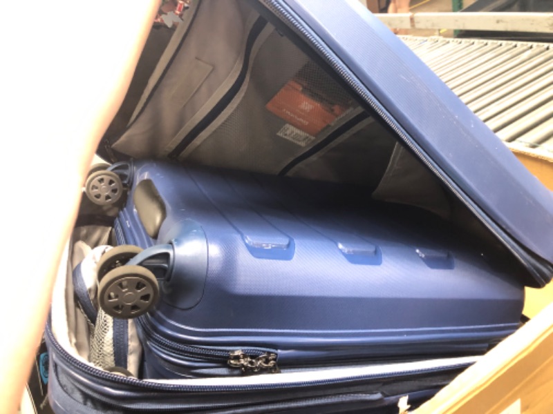 Photo 3 of ***CARRY-ON IS MISSING A WHEEL - SEE PICTURES***
Traveler's Choice Pagosa Indestructible Hardshell Expandable Spinner Luggage, Navy, 2-Piece Set (22/26)